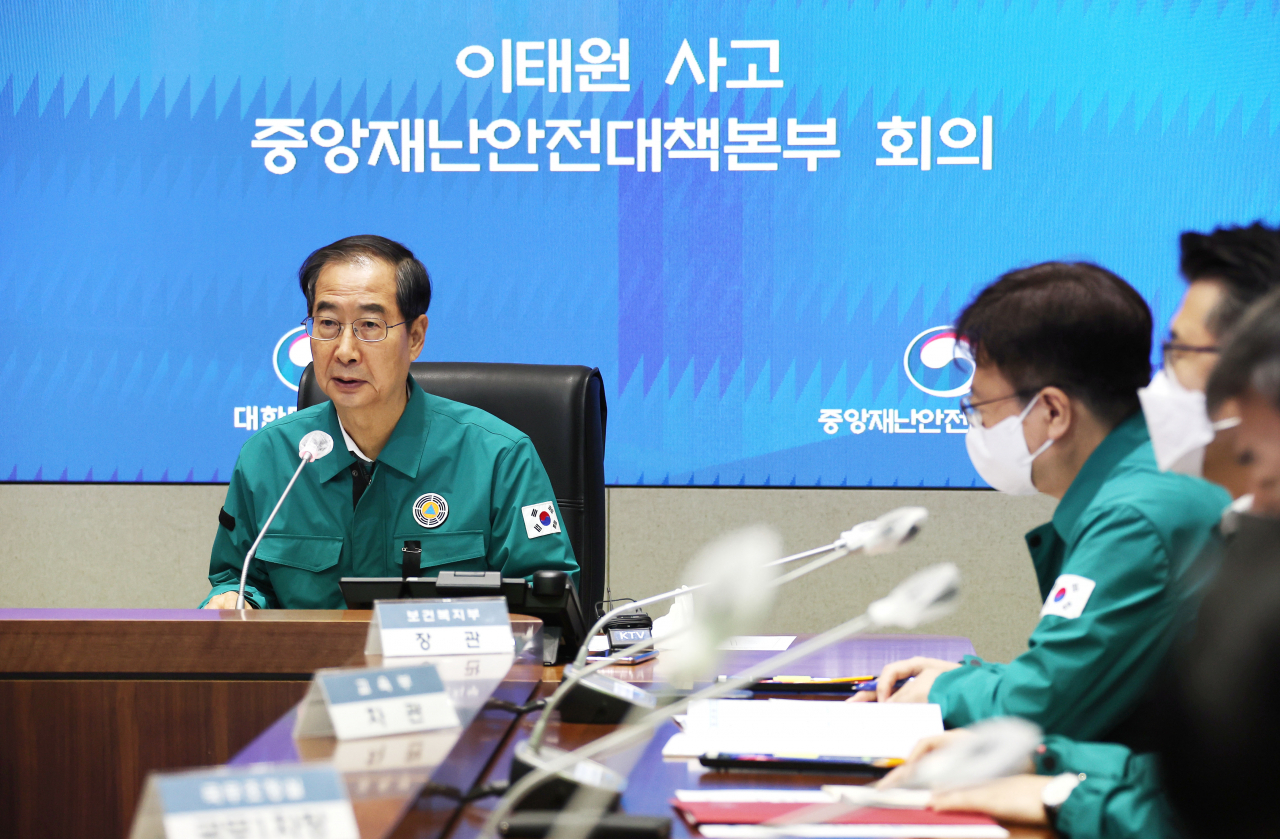 Prime Minister Han Duck-soo presides over a response meeting in Seoul on Tuesday, on the deadly crowd crush in Seoul's Itaewon area. (Yonhap)
