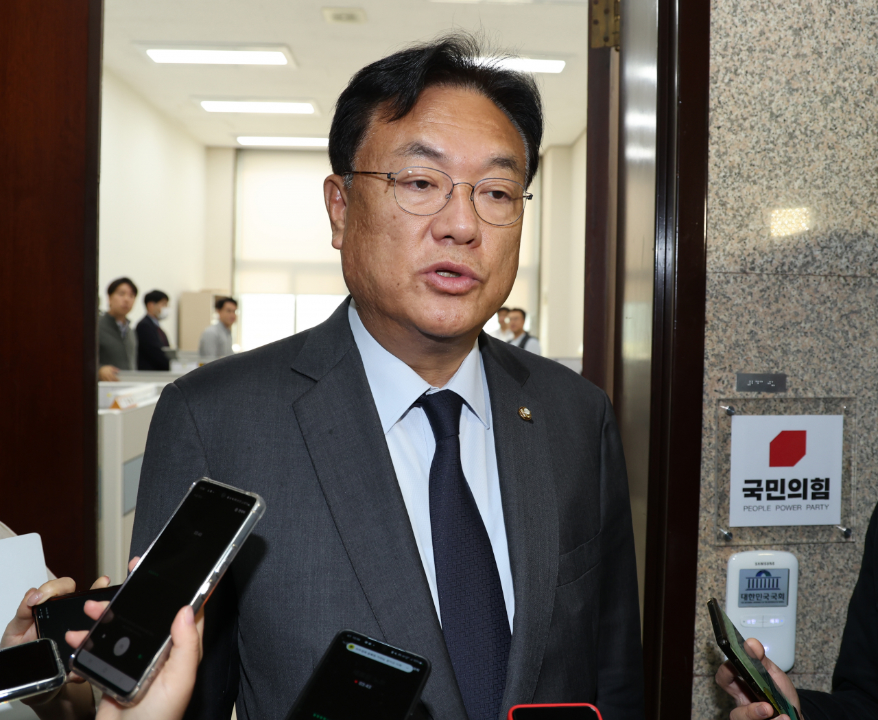 Rep. Chung Jin-suk, leader of the ruling People Power Party, speaks to the press at the National Assembly on Monday. (Yonhap)