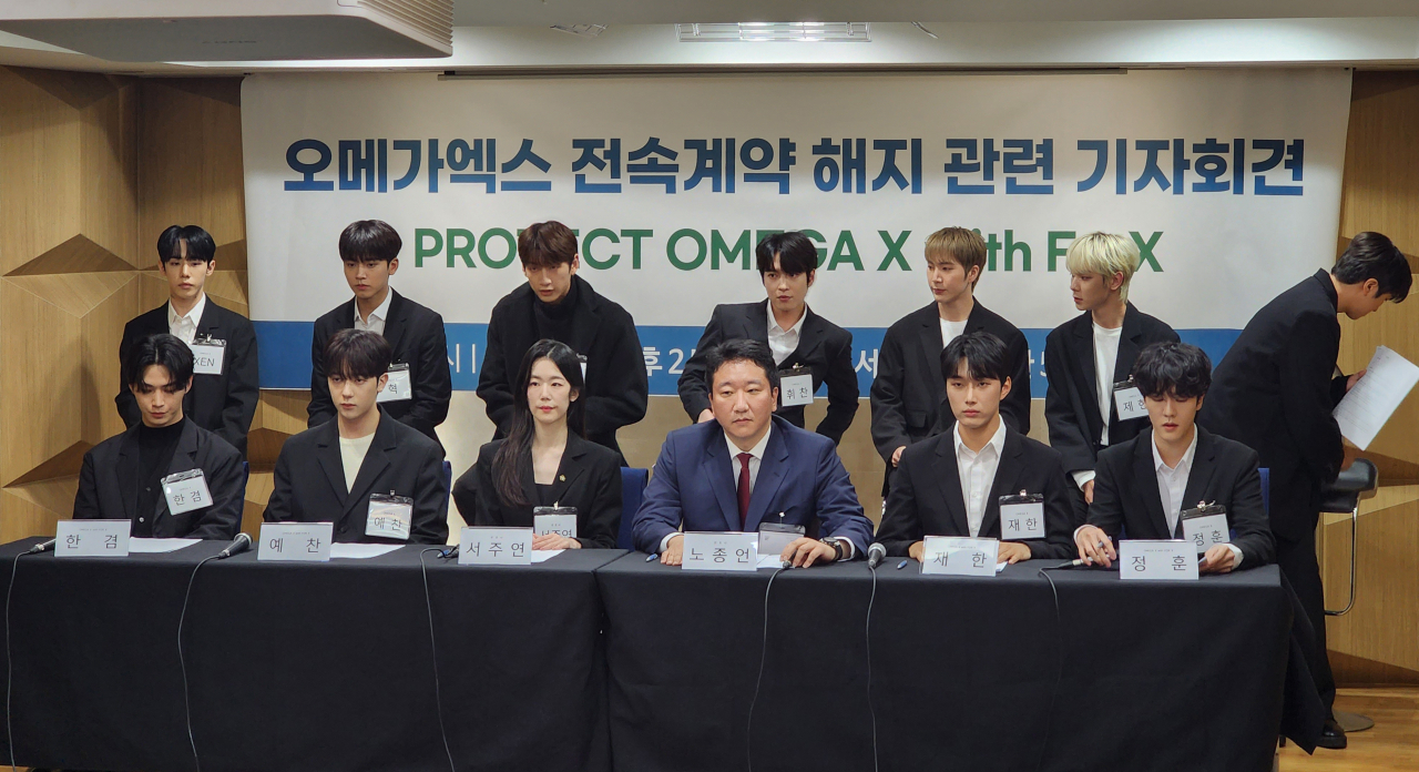 K-pop boy band Omega X and the group's legal representatives hold a press conference about the alleged abuse by Spire Entertainment's CEO and the termination of the band's contract with the agency at the Seoul Bar Association building in Seocho, Seoul, Wednesday afternoon. (Yonhap)