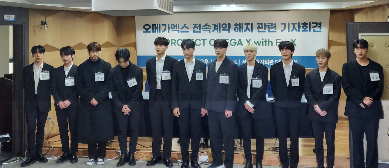 K-pop boy band Omega X members address the local media at a press conference about the alleged abuse by Spire Entertainment's ex-CEO at the Seoul Bar Association building in Seocho, Seoul, Wednesday afternoon. (Yonhap)