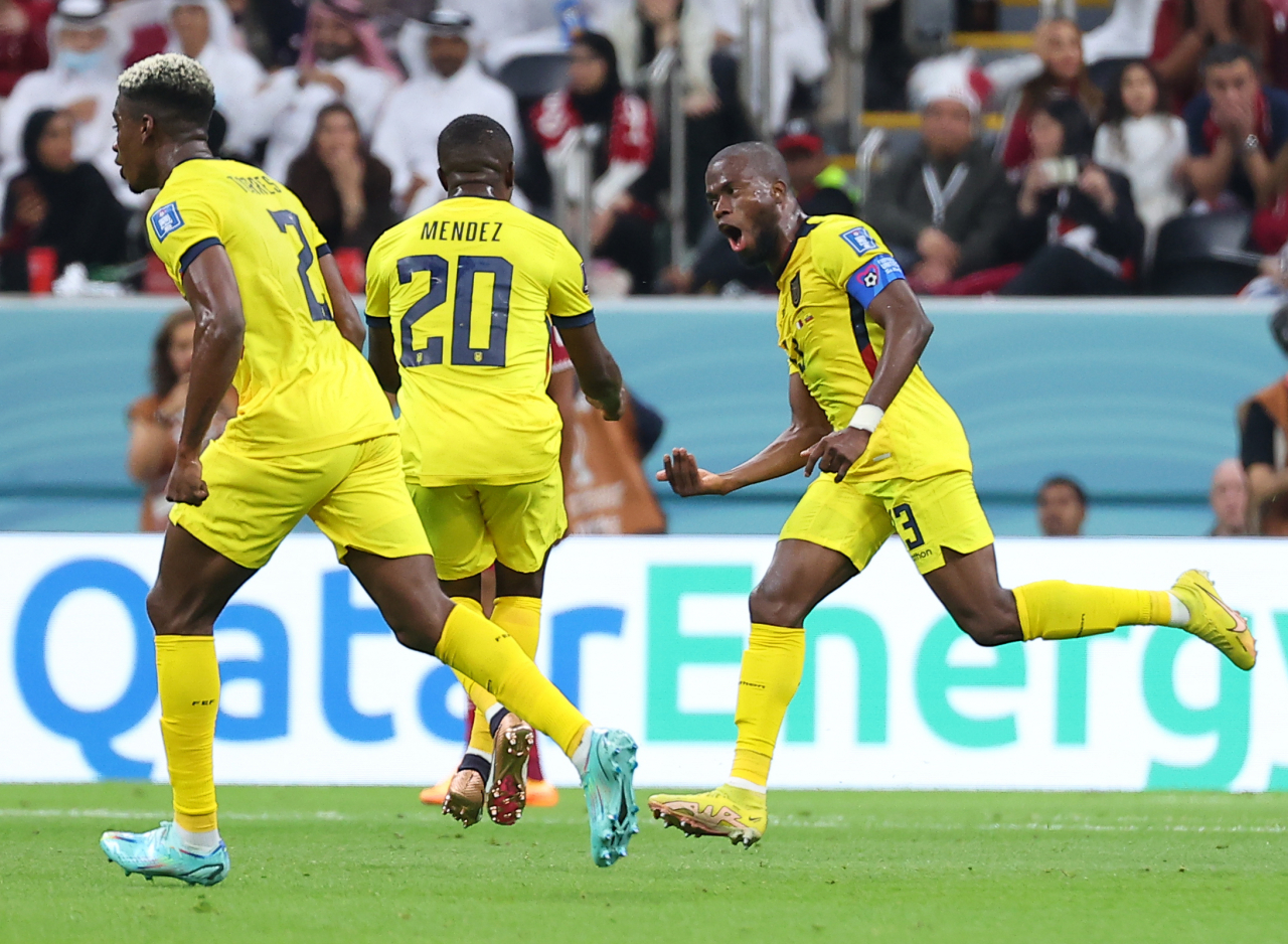 Enner Valencia of Ecuador (right) celebrates his goal against Qatar during the teams' Group A match at the FIFA World Cup at Al Bayt Stadium in Al Khor, Qatar, last Sunday. (Yonhap)