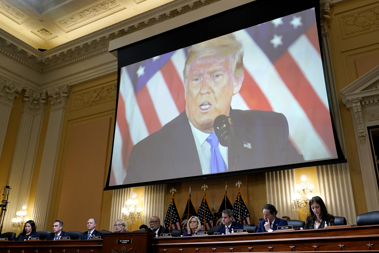 A video of former President Donald Trump is shown on a screen, as the House select committee investigating the Jan. 6 attack on the US Capitol holds its final meeting in Washington on Monday. AP-Yonhap