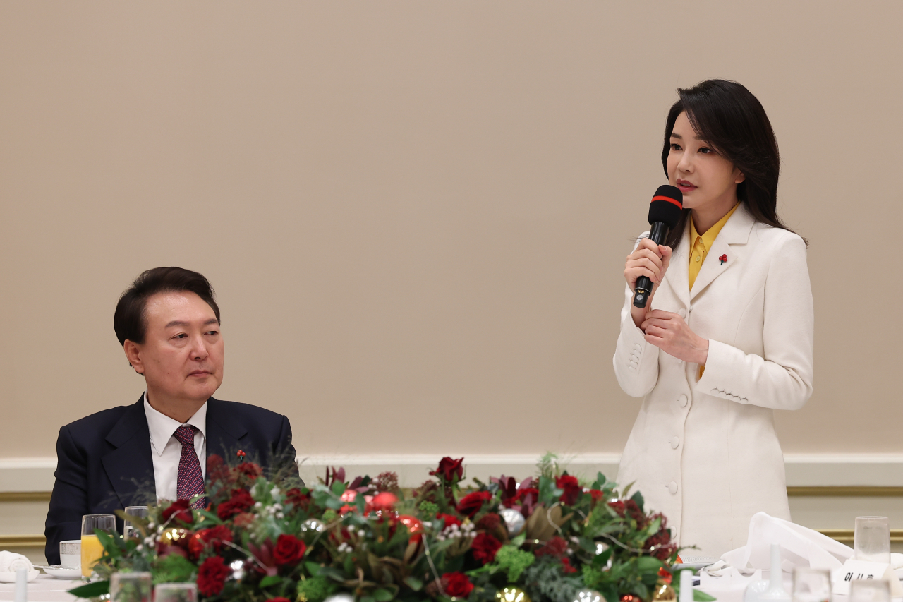 First Lady Kim Keon-hee speaks during a dinner with young people living in institutional care on Friday at Cheong Wa Dae. (Yonhap)