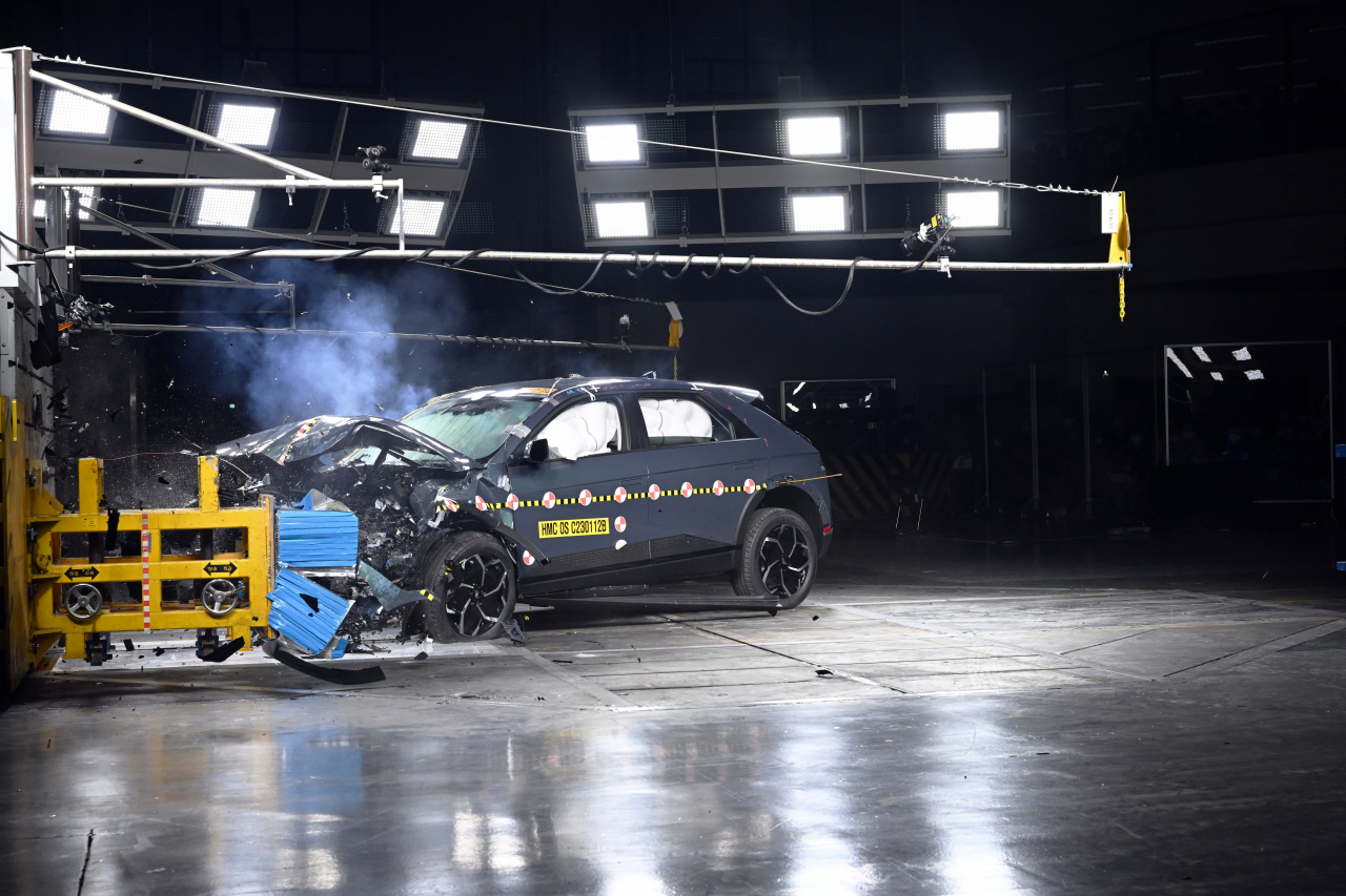 Hyundai Motor Group's Ionic 5 runs into a barrier during a crush test held at its Namyang Technology Institute in Hwasung, Gyeonggi Province, Thursday. (Hyundai Motor Group)