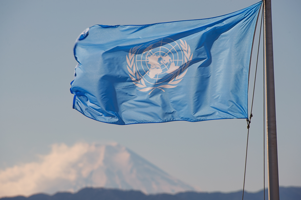 The United Nations flag waves at Yokota Air Base, Japan, Jan. 10, 2014. Yokota AB is one of the U.N. Command bases under the UNC-Japan Status of Forces Agreement decrees. (Photo - US Air Force)