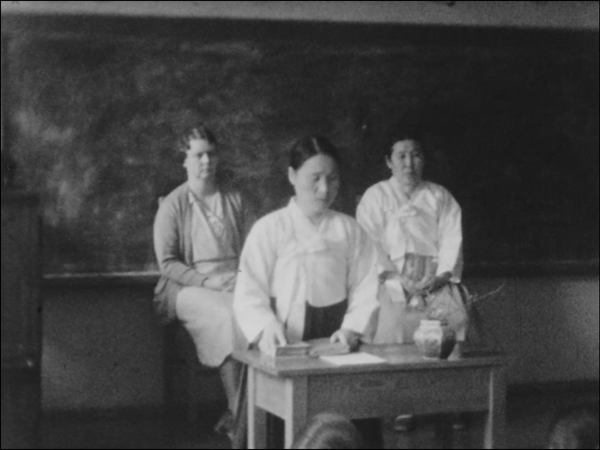A screencapture of a video shows a student presenting in front of foreign missionaries and school officials at a women's school in Jeonju, North Jeolla Province. (Korea Film Archive)