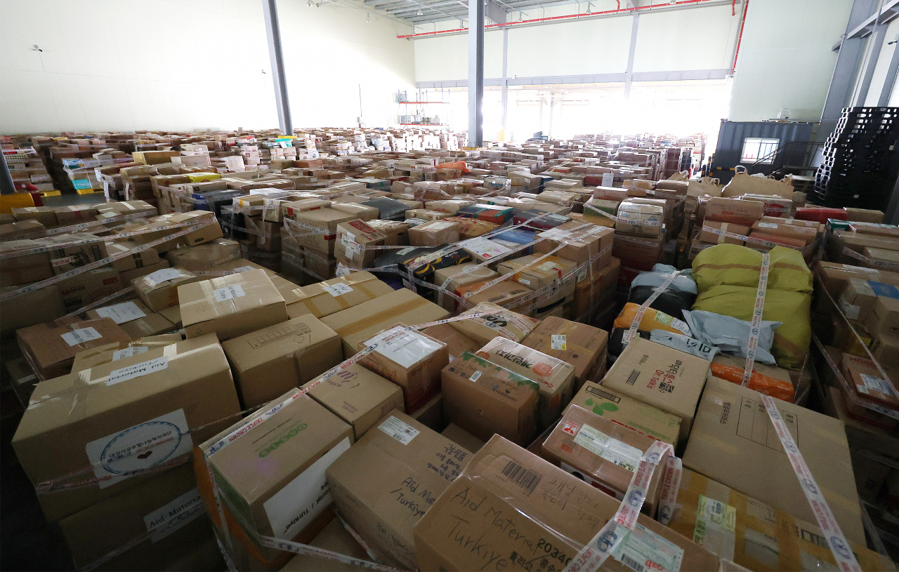 Boxes of aid goods sent from South Korea are seen in a warehouse nearby Incheon International Airport on Sunday. (Yonhap)