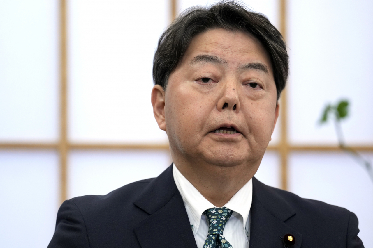 Japanese Foreign Minister Yoshimasa Hayashi speaks to media outlets at his office on Monday (AP-Yonhap)