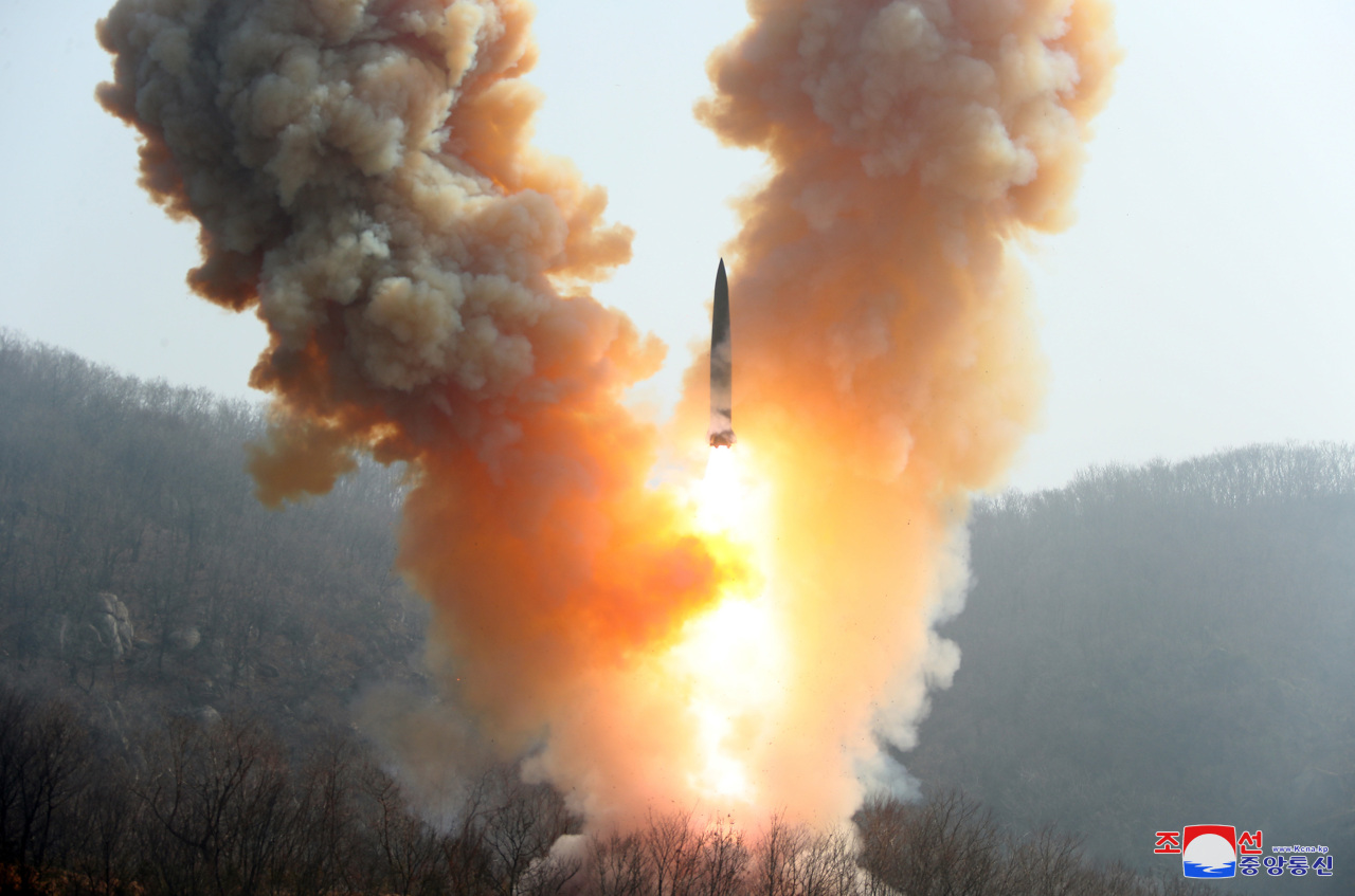 This photo, carried by North Korea`s official Korean Central News Agency on March 20, 2023, shows the North conducting military drills simulating a tactical nuclear counterattack against its enemies. (Yonhap)