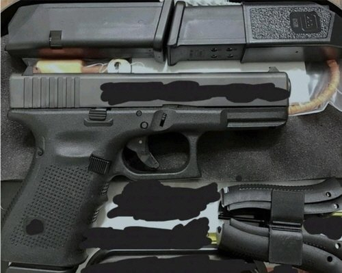 This picture of a pistol was attached to an online post threatening to assassinate President Yoon Suk Yeol. (Yonhap)