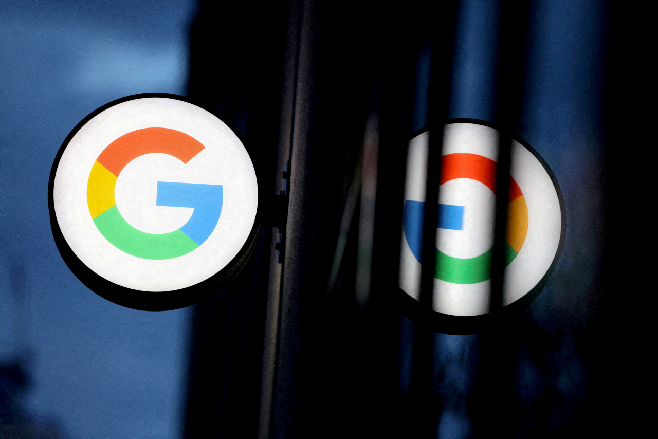 A logo for Google is seen in a reflection. (Reuters-Yonhap)