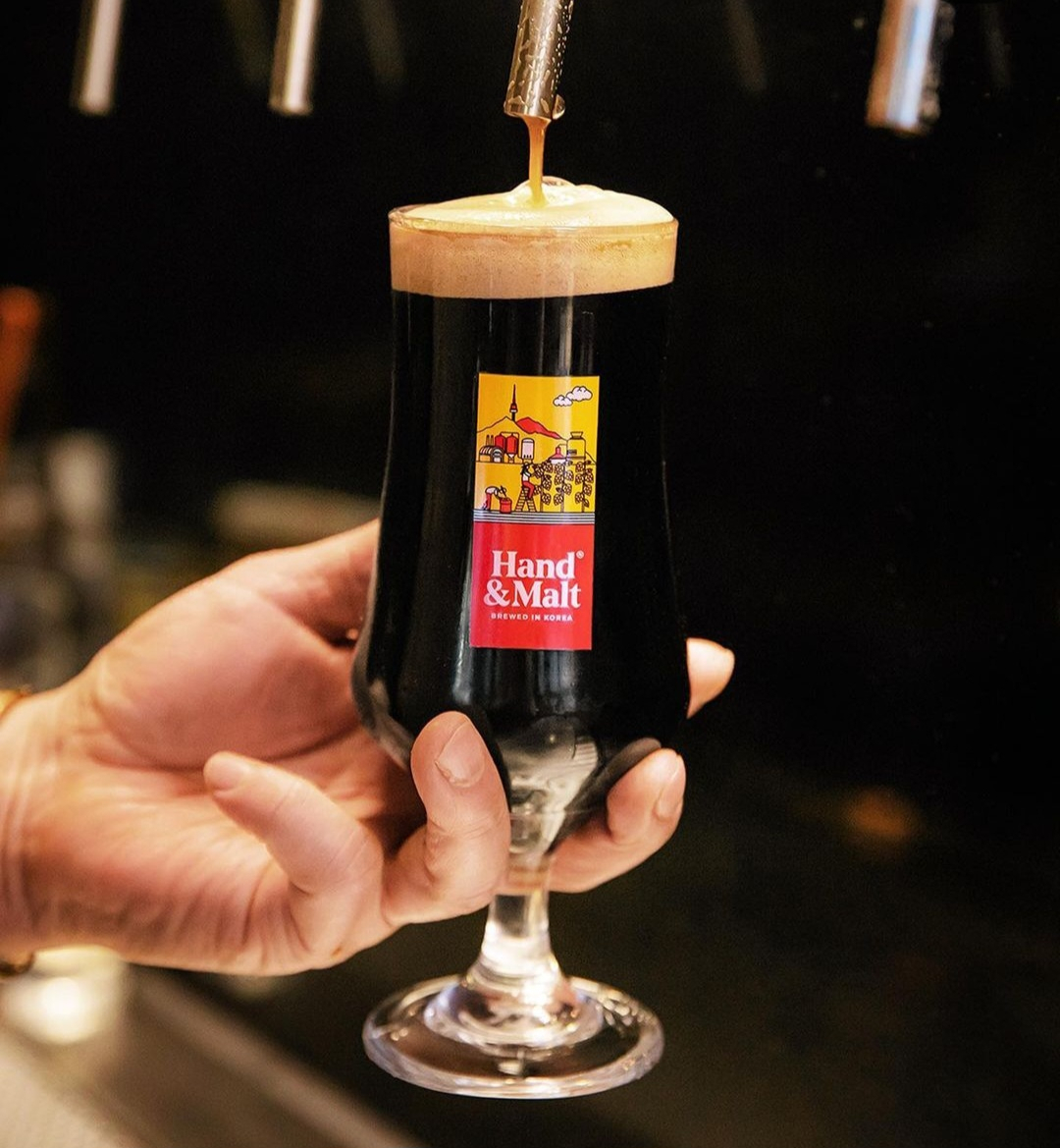 Stout beer is served at the Hand and Malt Brew Lab. (The Hand and Malt Brewing Co.)
