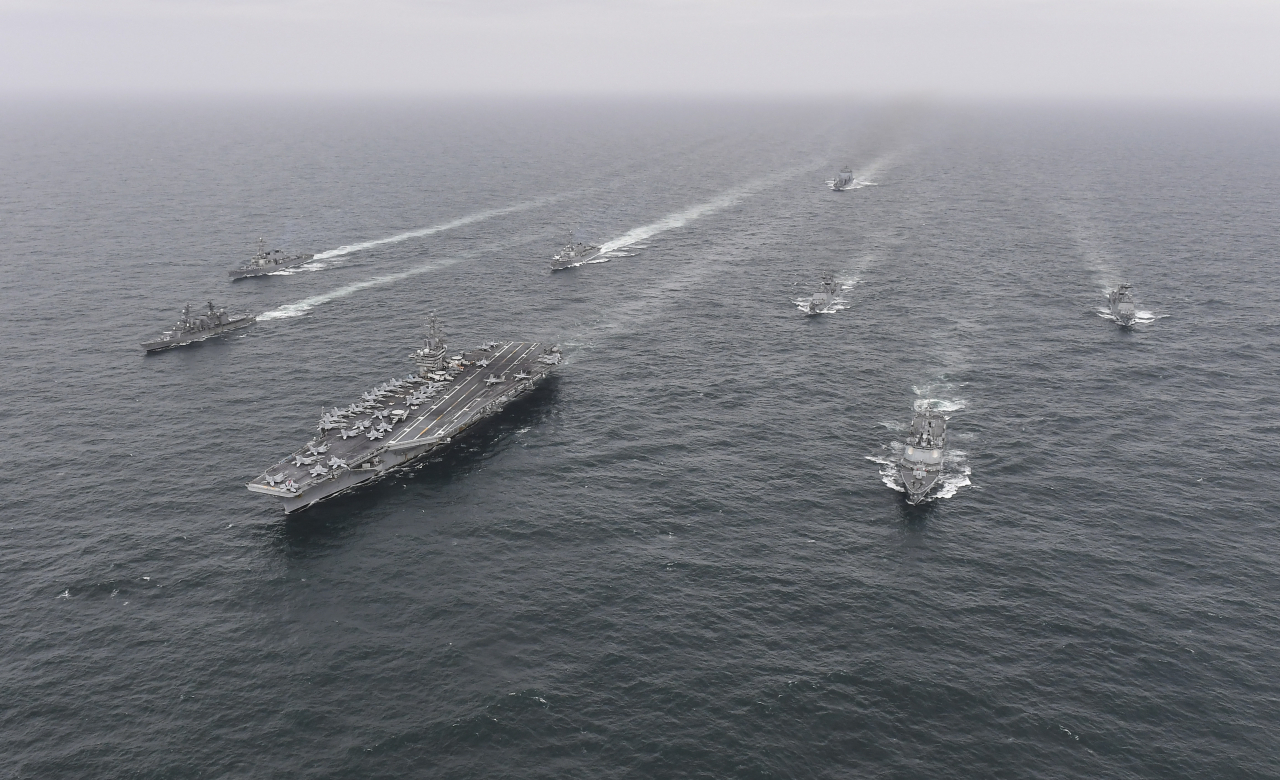 This photo from April 4 shows the South, the United States and Japan holding a two-day trilateral naval exercise in waters south of the Korean Peninsula. (South Korean Navy)