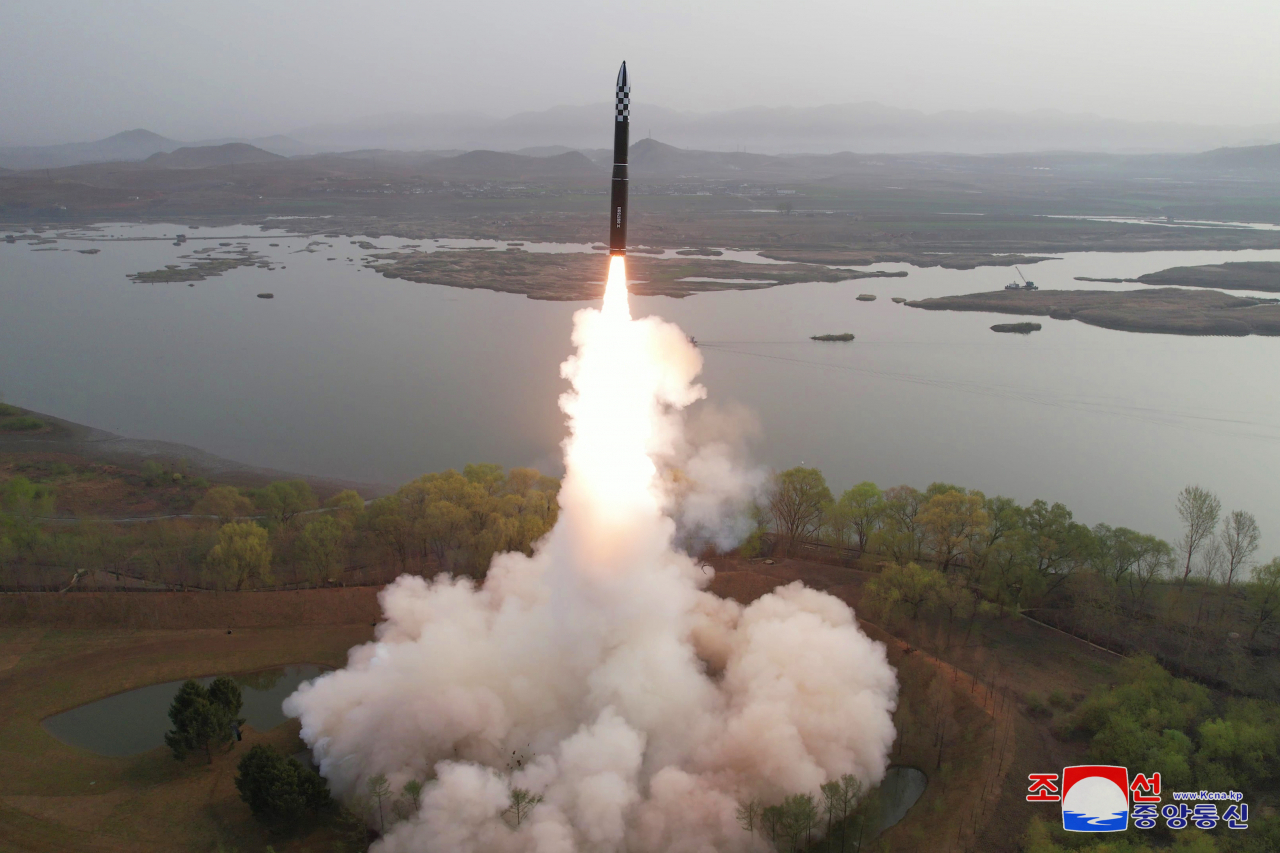 North Korea tests a solid-fuel intercontinental ballistic missile for the first time on Thursday in this photo released by the Korean Central News Agency on Friday. (KCNA-Yonhap)