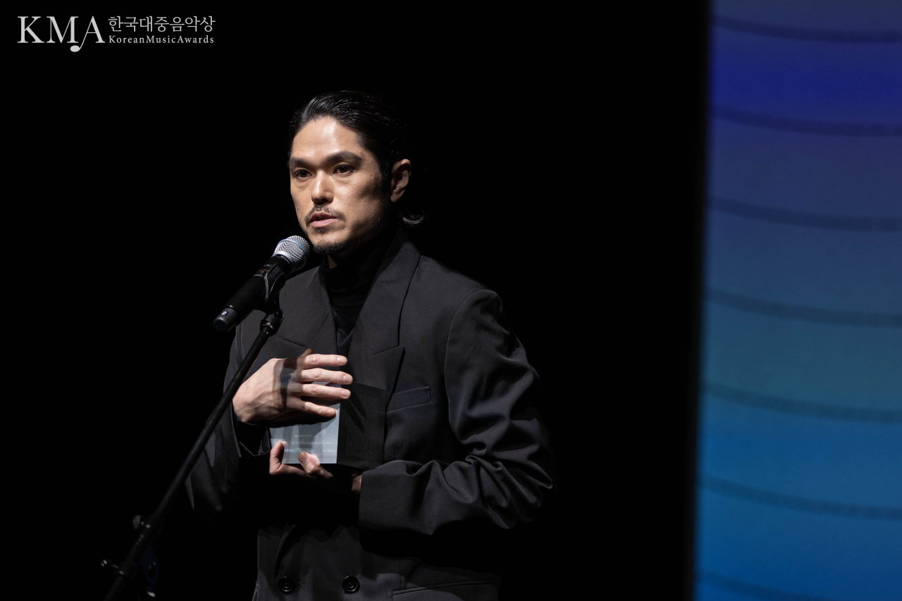 Producer 250 receives an award at the 20th Korean Music Awards ceremony held in Seoul on March. (KMA)