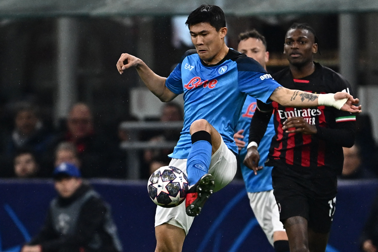 In this file photo from last Wednesday, Kim Min-jae of Napoli clears the ball during the first leg of the UEFA Champions League quarterfinals against AC Milan at San Siro Stadium in Milan, Italy. (AFP)