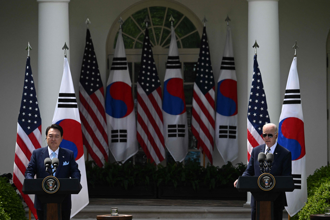 US President Joe Biden and South Korean President Yoon Suk Yeol participate in a news conference in the Rose Garden of the White House in Washington on Wednesday. (AFP)
