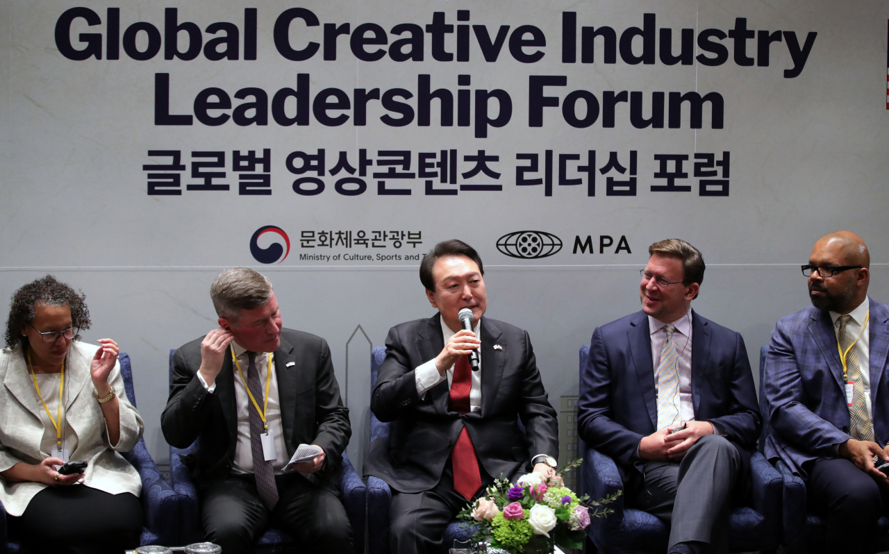 South Korean President Yoon Suk Yeol talks about the Korean content industry during the Global Video Content Leadership Forum, organized by the Motion Picture Association of America at MPA's headquarters in Washington on Thursday. (Yonhap)
