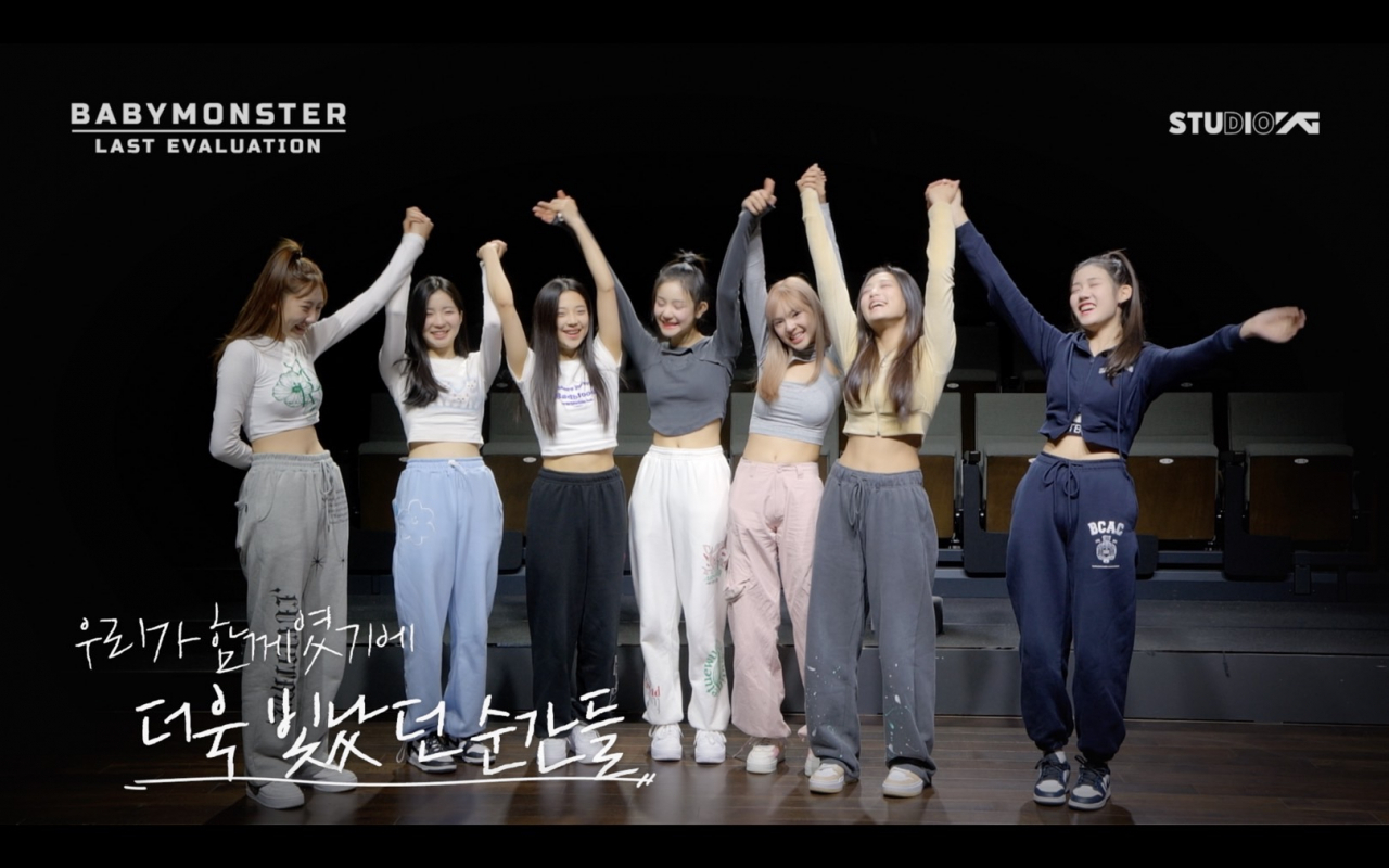The pre-debut members of YG Entertainment's new girl group, Babymonster, cheer together after their last evaluation on Friday. (YG Entertainment)