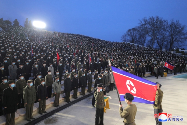 This photo released on March 18 shows North Korean youths enlisting for the military in protest of ongoing joint military exercises between South Korea and the United States (KCNA)