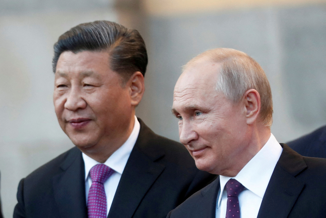 Chinese President Xi Jinping and Russian President Vladimir Putin attend the presentation of a Haval F7 SUV produced at the Haval car plant located in Russia's Tula region, at the Kremlin in Moscow, Russia, June 5, 2019. (File Photo - Reuters)
