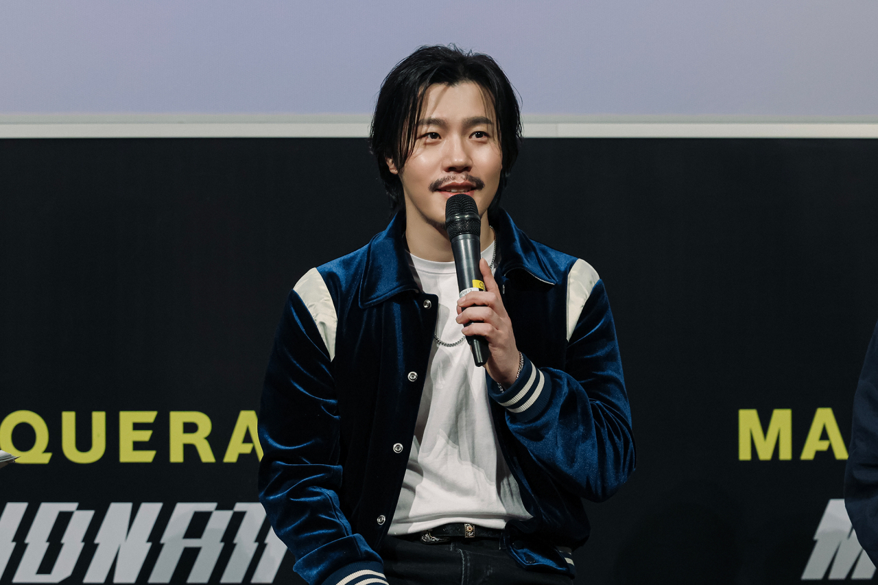 Singer Lee Hyun speaks during a press conference about his new single