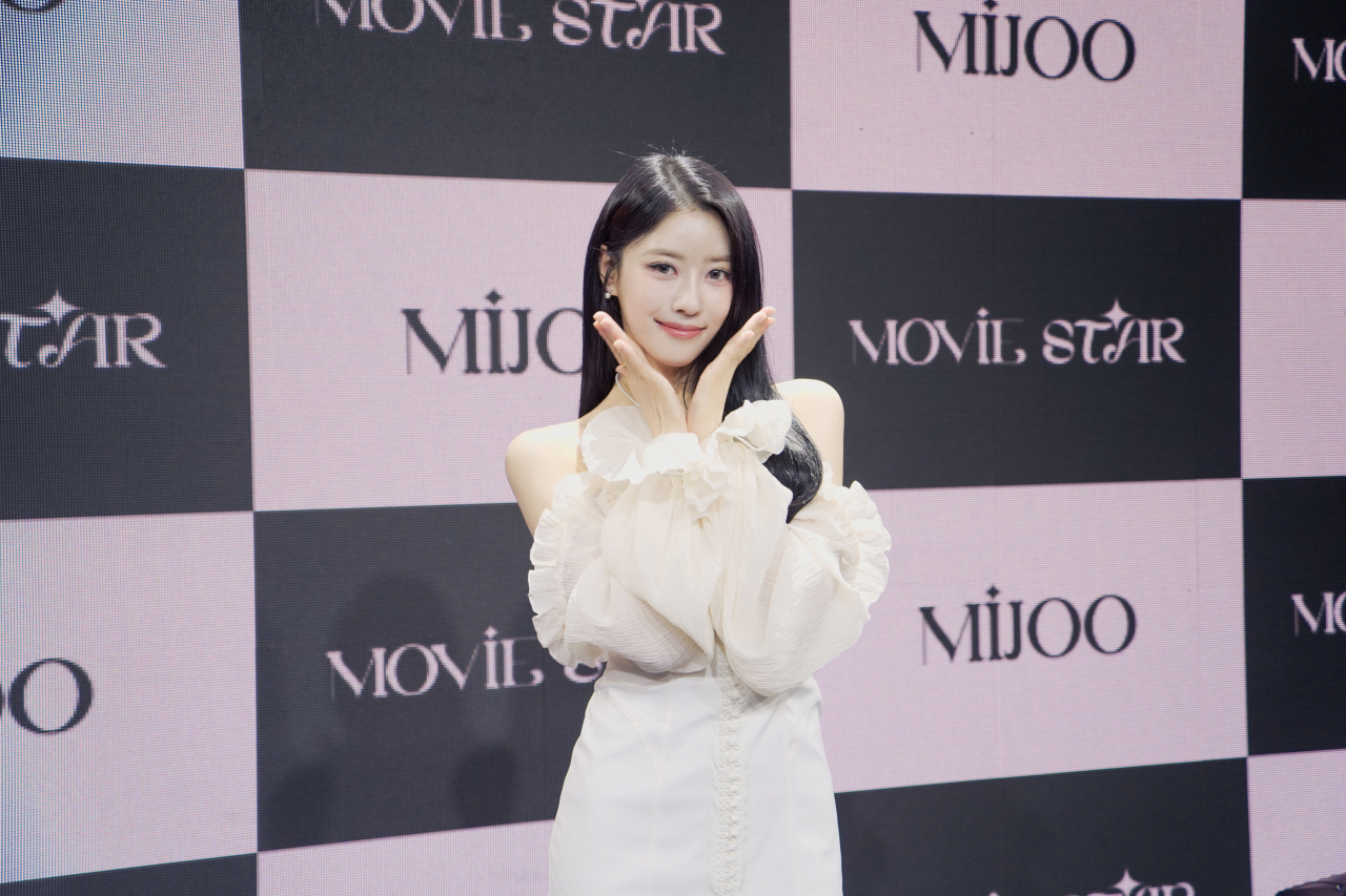 Singer Lee Mijoo poses for picture during a press showcase for her first solo single