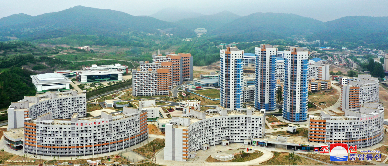 This photo, released Monday, shows a bird's-eye view of the Taephyong district in Pyongyang, where the North has completed the construction of new homes. (KCNA)