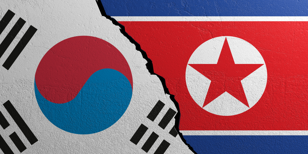 The flags of South Korea (left) and North Korea. (123rf)