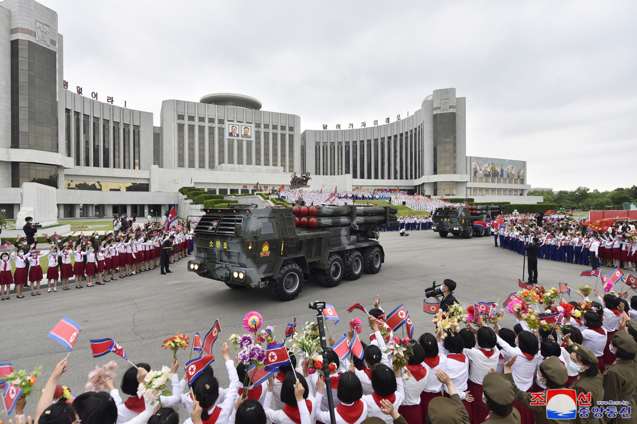 This photo from Wednesday, shows multiple rocket launchers donated by the Korean Children's Union moving along outside Mangyongdae Schoolchildren's Palace in Pyongyang the previous day. (KCNA)
