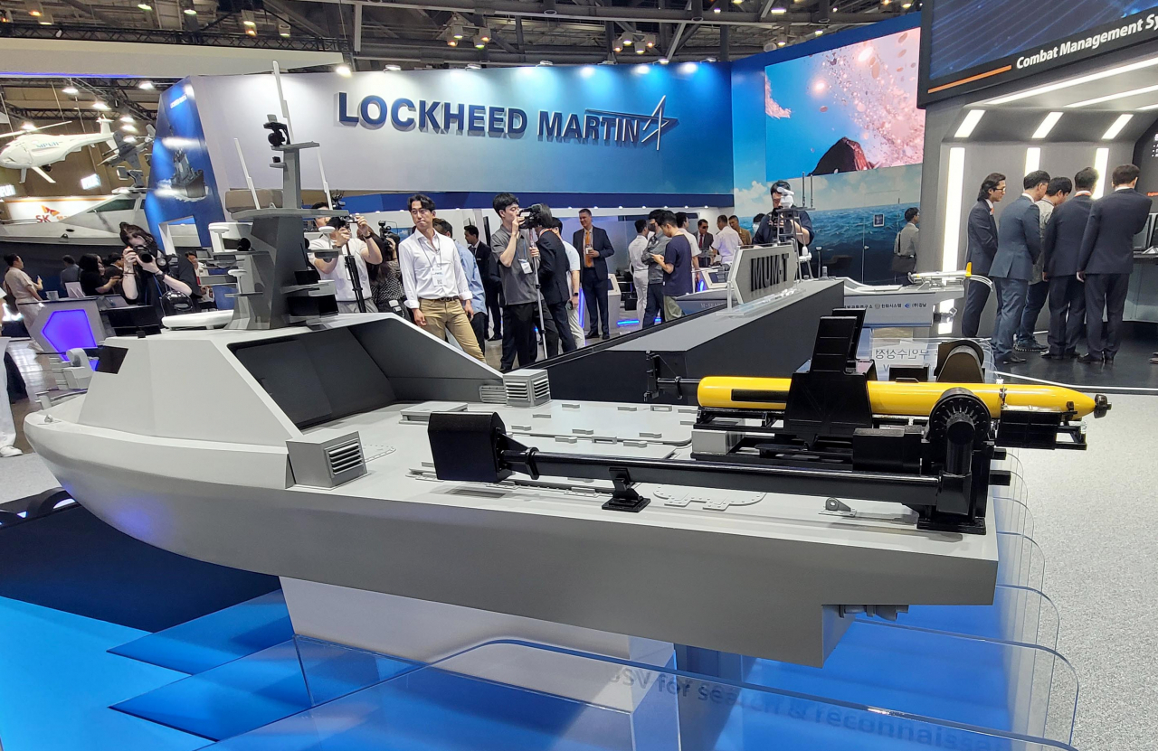 An unmanned surface vehicle for reconnaissance operations is on display at Hanwha Systems' booth at the International Maritime Defense Industry Exhibition 2023 in Busan on June 7. (Yonhap)