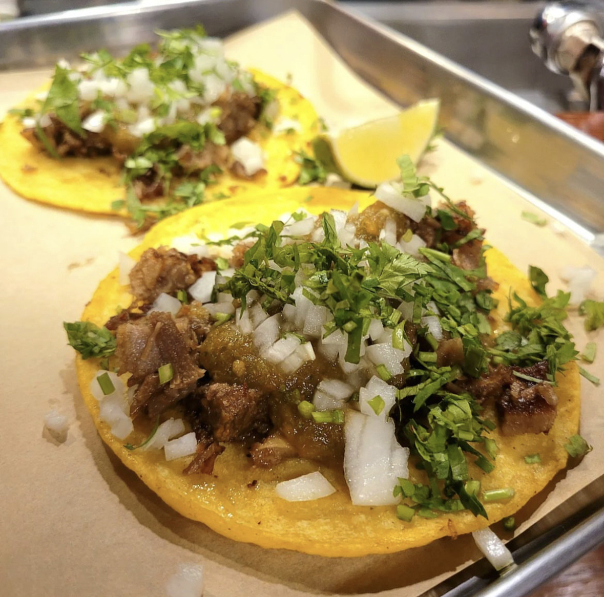 Beef suadero tacos served at Crispy Pork Town (Courtesy of Crispy Pork Town's Instagram)