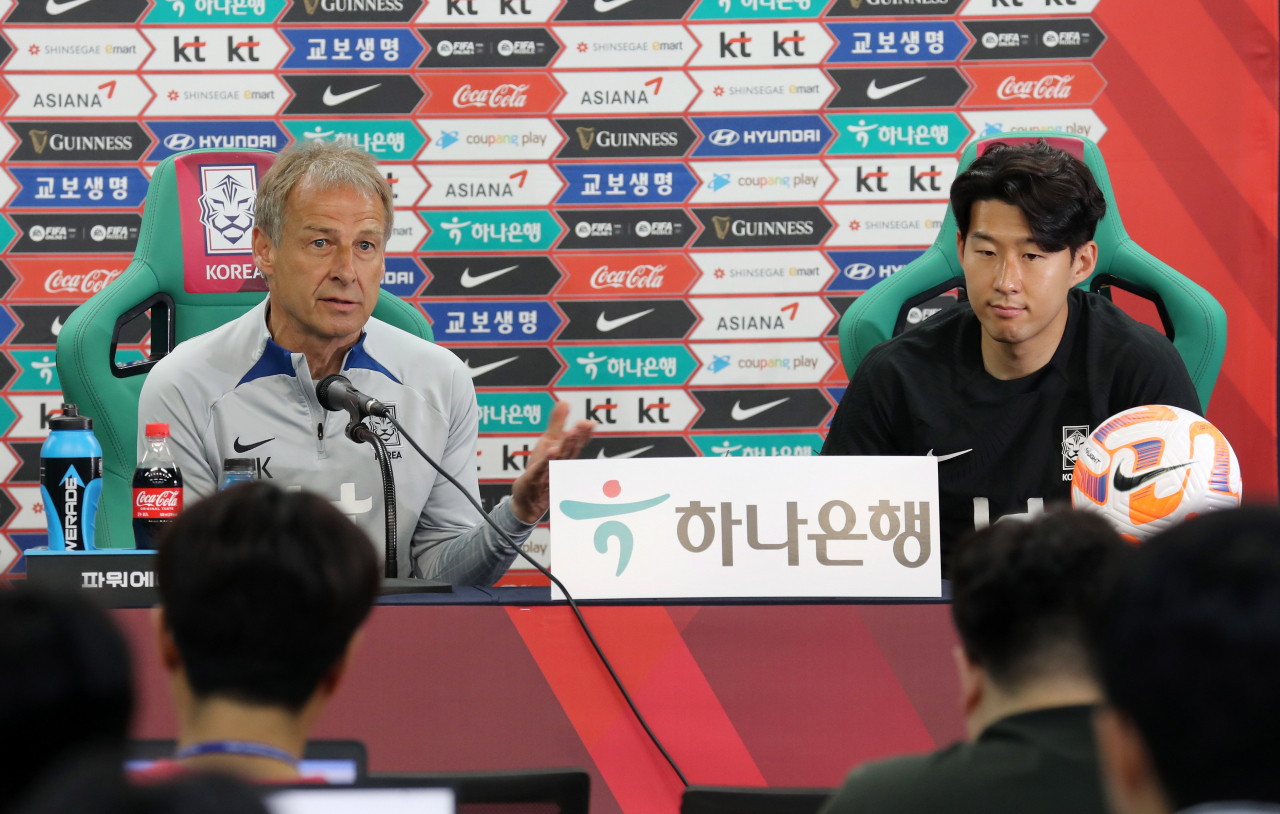 South Korea head coach Jurgen Klinsmann (left) and his captain Son Heung-min attend a press conference at Daejeon World Cup Stadium in the central city of Daejeon on Monday, the eve of South Korea's friendly football match against El Salvador. (Yonhap)