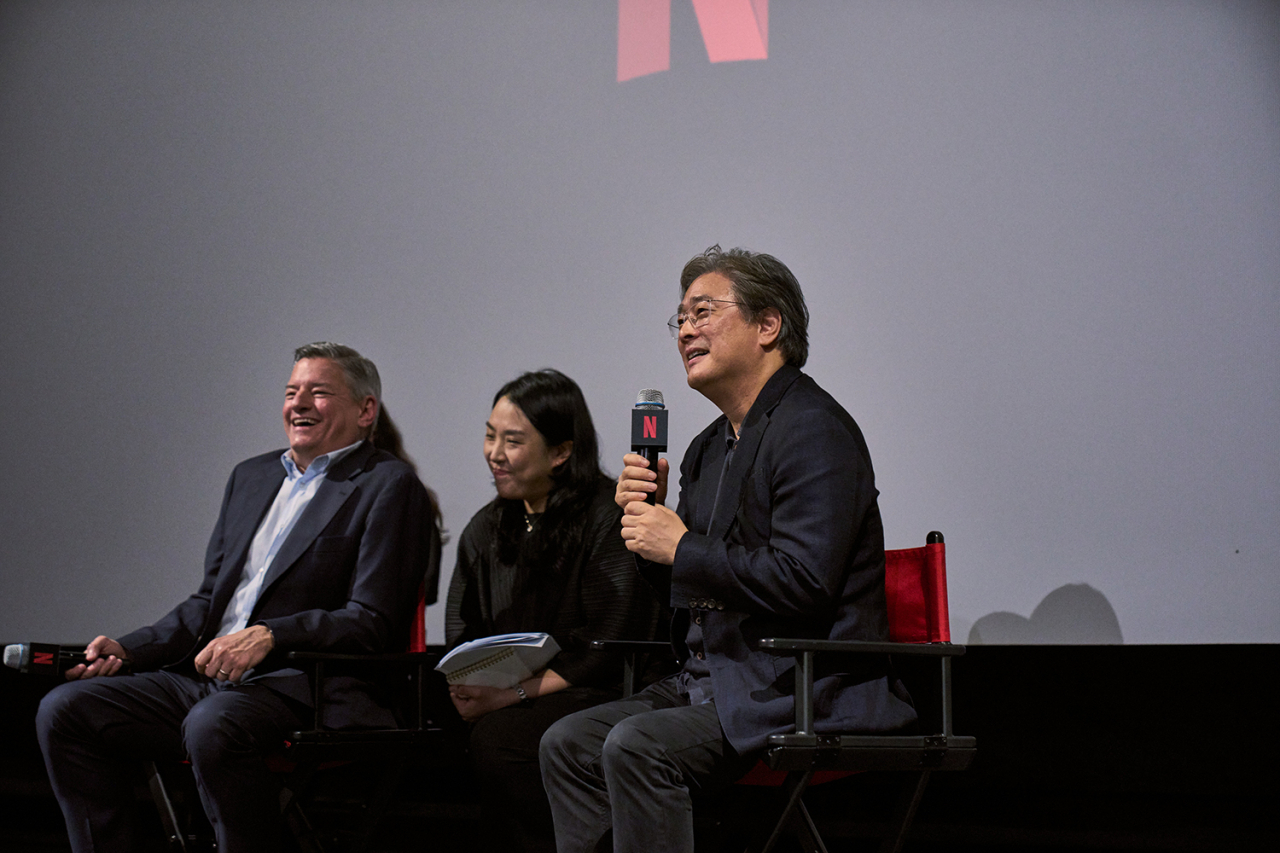 Director Park Chan-wook (far right) speaks during a talk held with Netflix co-CEO Ted Sarandos (far left) and aspiring content creators in Seoul on Wednesday. (Netflix)