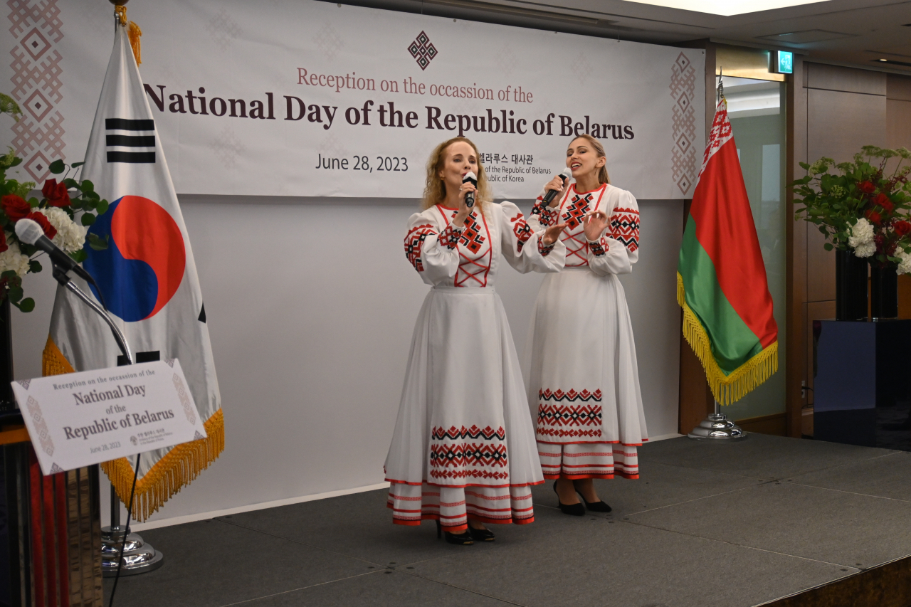 Artists from Belarus perform a traditional Belarusian song during the reception of Belarus National Day at Lotte Hotel, Seoul, Wednesday. (Sanjay Kumar/The Korea Herald)