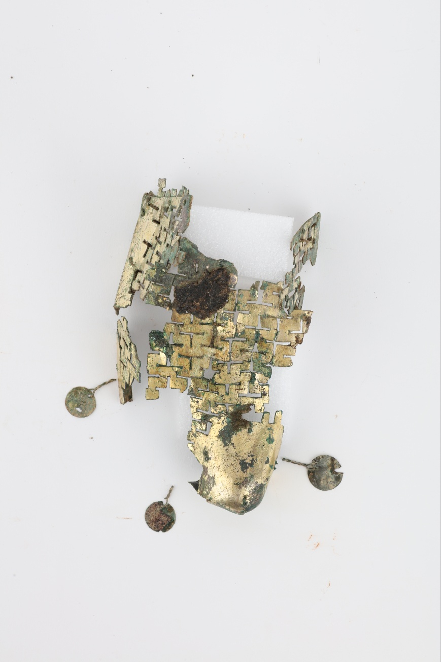 Part of a gilt-bronze shoe discovered at Jjoksaem Tomb No. 44 (CHA)