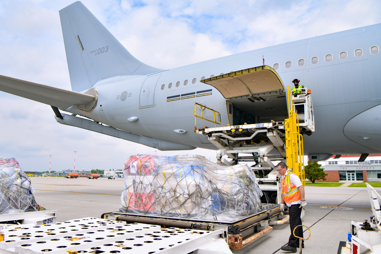 The armed service's KC-330 transport aircraft unloads emergency aid supplies at an airport in Canada to support the country's efforts to fight wildfires on July 5. (Republic of Korea Air Force)
