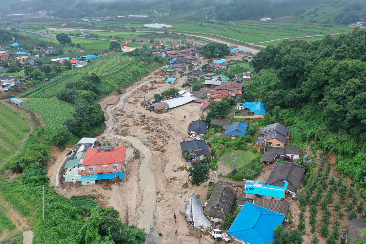 A landslide devastates Beolbang-ri village in Gamcheon-myeon, Yecheon County, North Gyeongsang Province, Sunday. (Yonhap)