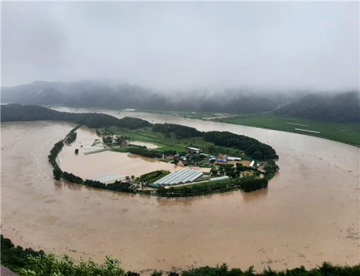 The Hoeryongpo Meandering Stream, which is damaged due to heavy rain, in Yecheon, North Gyeongsang Province (CHA)