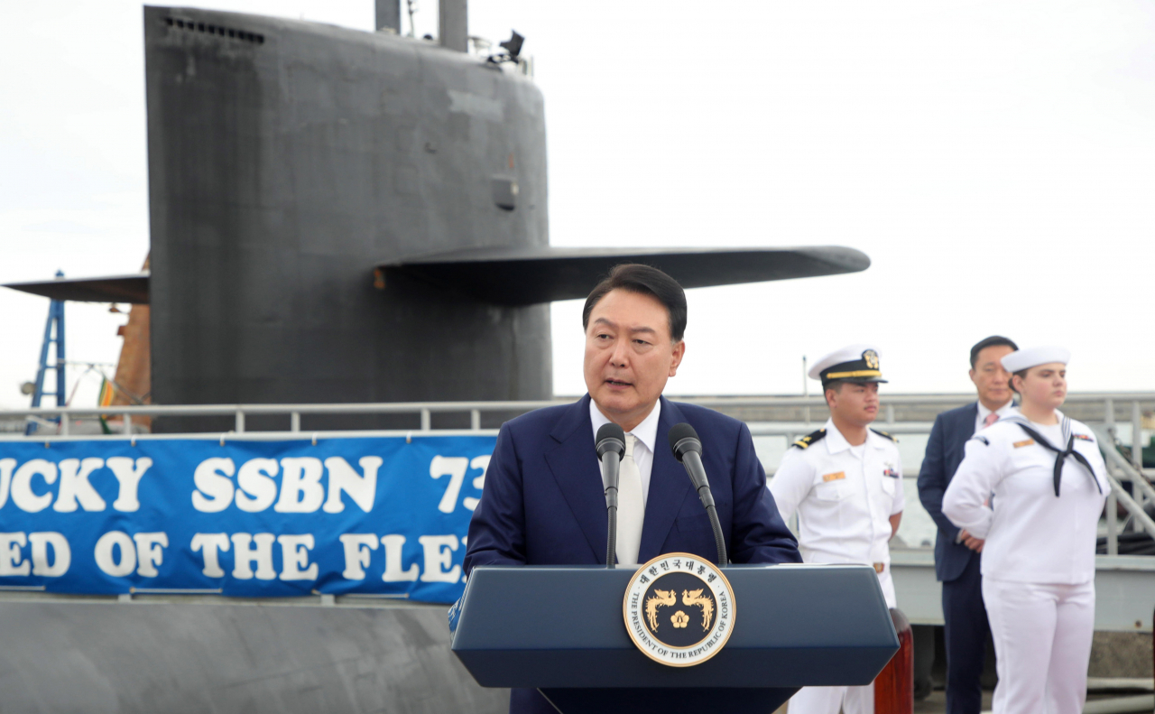 President Yoon Suk Yeol board the US Navy's Ohio-class ballistic-missile submarine, the USS Kentucky, a day after the ship arrived at a Korean naval base near Busan, marking the first visit of a US nuclear-capable submarine in more than four decades, Tuesday. (Joint Press Corps)