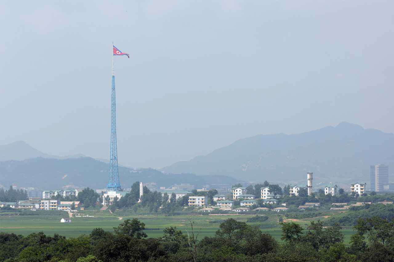 This photo taken from the truce village of Panmunjom in July 2022, shows the landscape of North Korea's Kijong-dong, a
