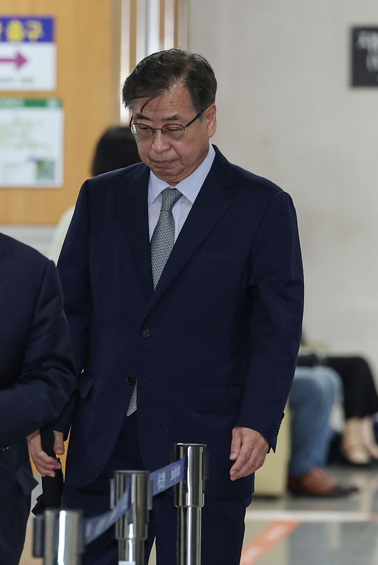 Suh Hoon, ex-national security chief at Moon Jae-in presidential office, appears at the Seoul central district court on July 14. (Yonhap)