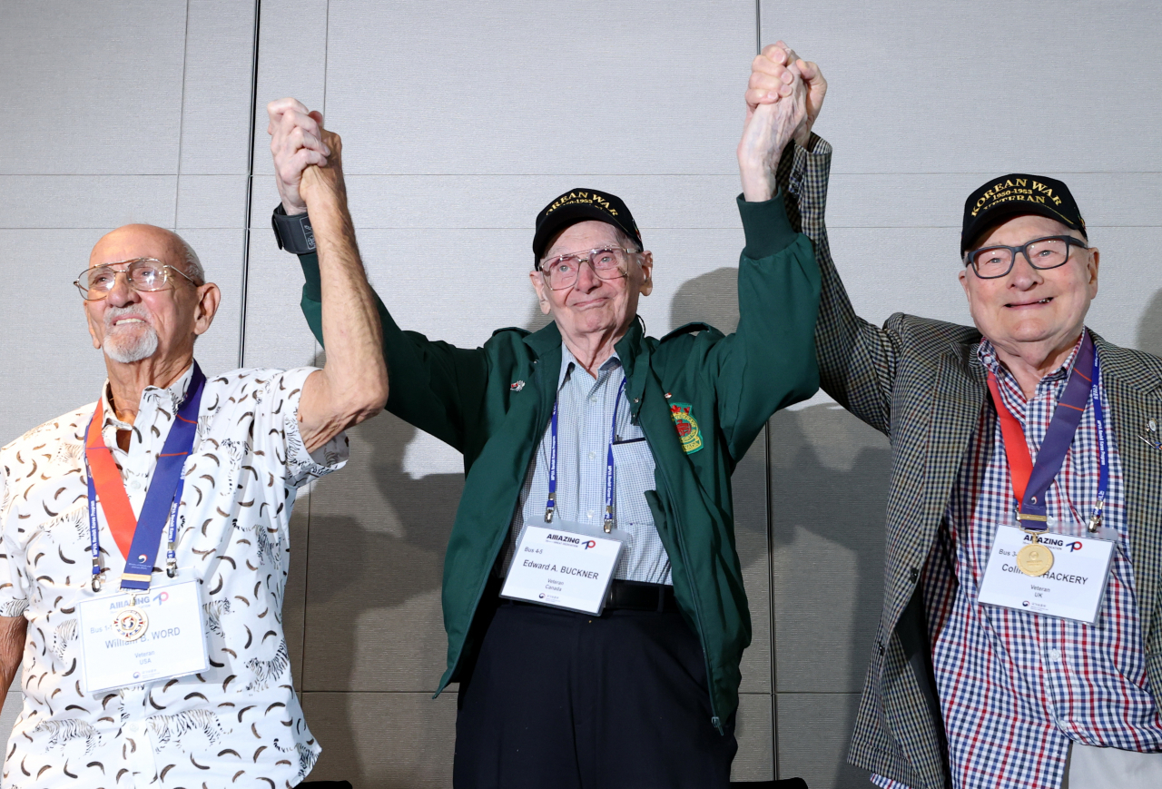 From left: US veteran William Word, Canadian veteran Edward Buckner and British veteran Colin Thackery pose for a photo during a joint interview at Sofitel Ambassador Hotel in Jamsil, southern Seoul, Tuesday. (Yonhap)