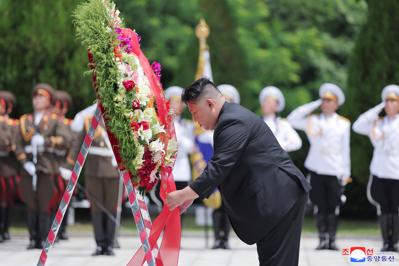 North Korean leader Kim Jong-un placing a wreath at the Friendship Tower in Pyongyang on Tuesday, to mark the 70th anniversary of the Korean War armistice. (KCNA)