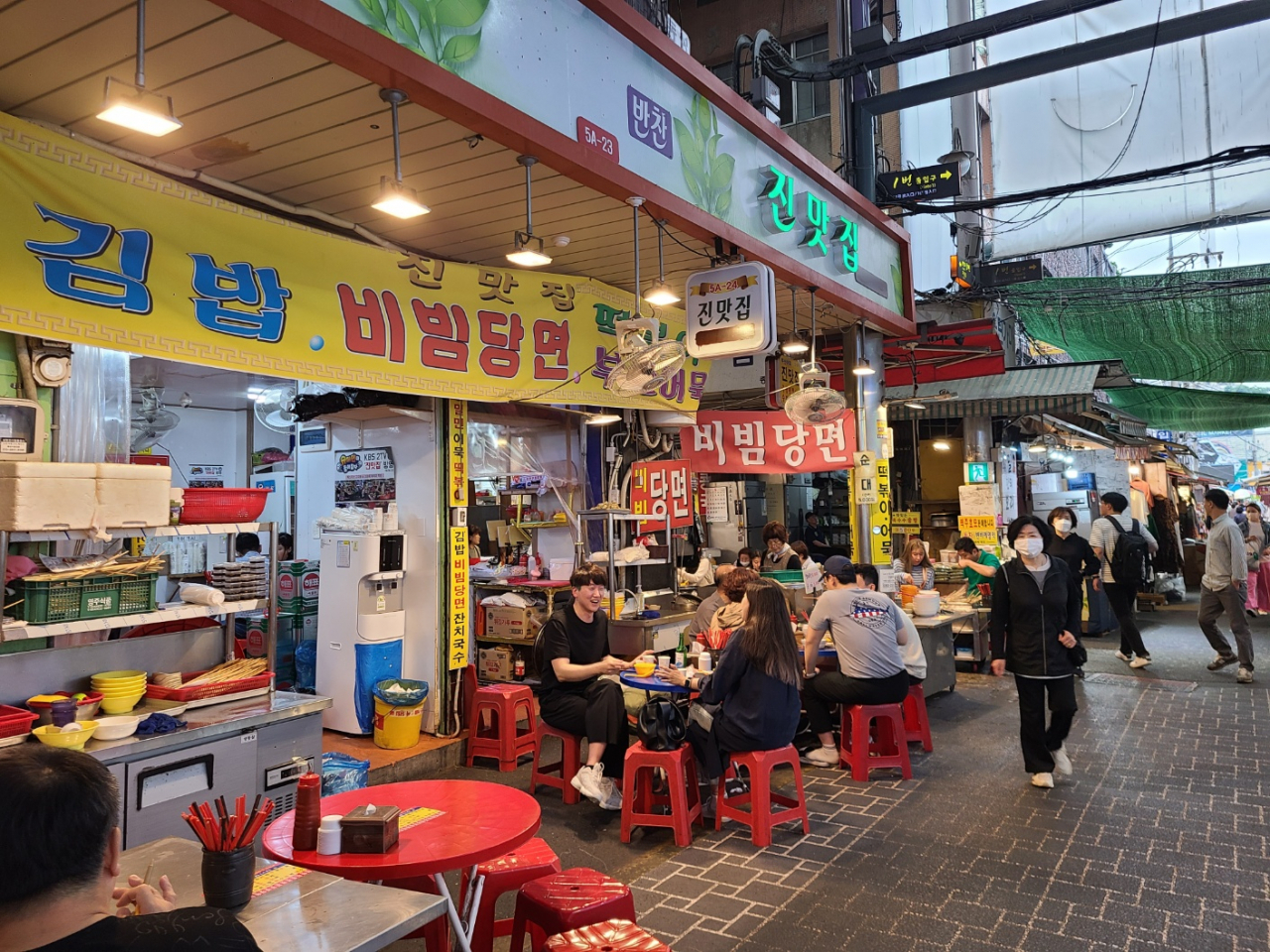 Visitors dine at a restaurant at Bupyeong 