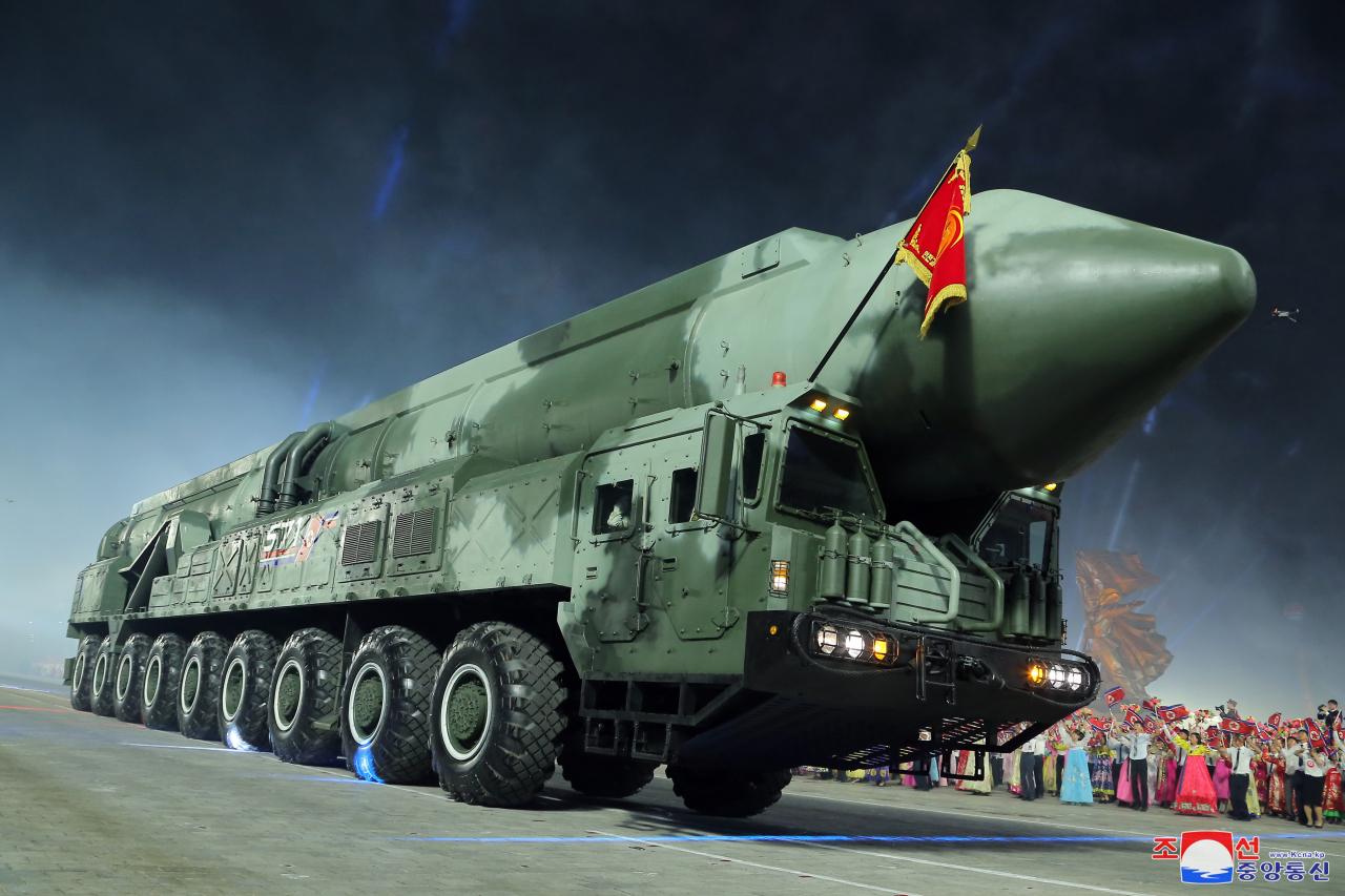 A Hwasong-18 solid-fuel intercontinental ballistic missile (ICBM) is displayed during a military parade, attended by North Korean leader Kim Jong-un, at Kim Il-sung Square in Pyongyang on Thursday night, to mark the 70th anniversary of the signing of the armistice that halted the 1950-53 Korean War, in this photo released the next day by North Korea's official Korean Central News Agency. (Yonhap)