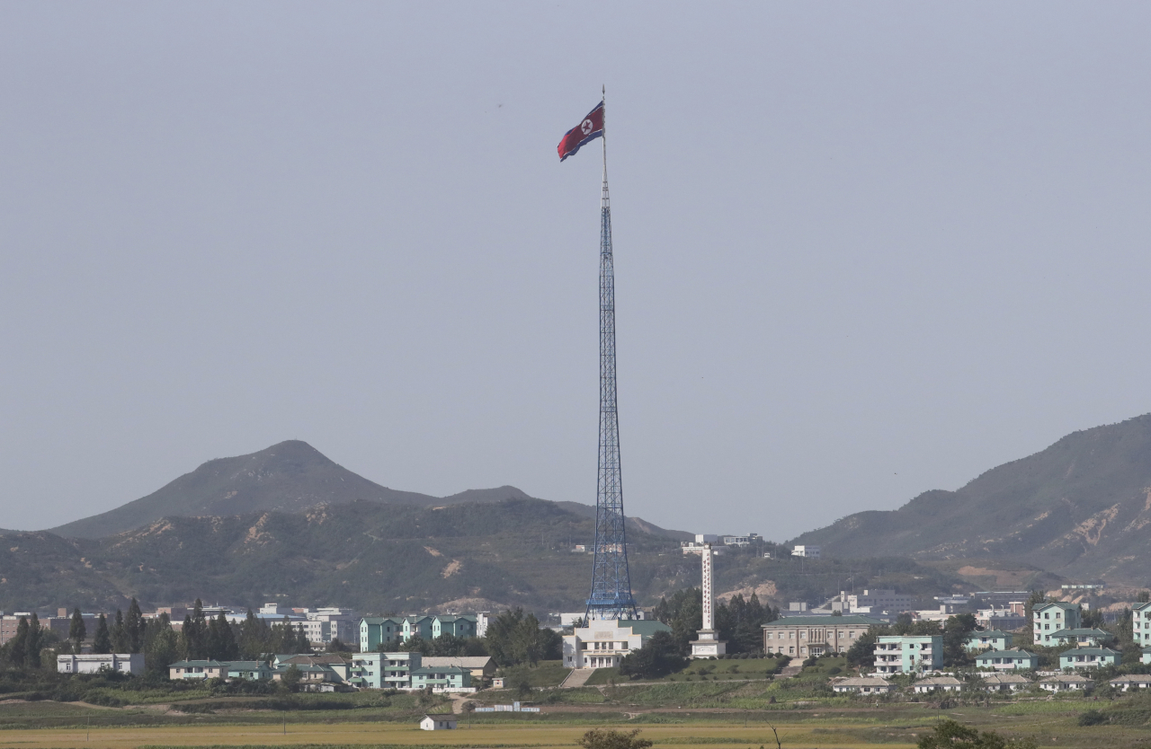 A North Korean flag flutters in the wind atop a 160-meter tower in the North's Kijong-dong village near the truce village of Panmunjom in the Demilitarized Zone in Paju, South Korea on Sept, 28, 2017. (AP-Yonhap)