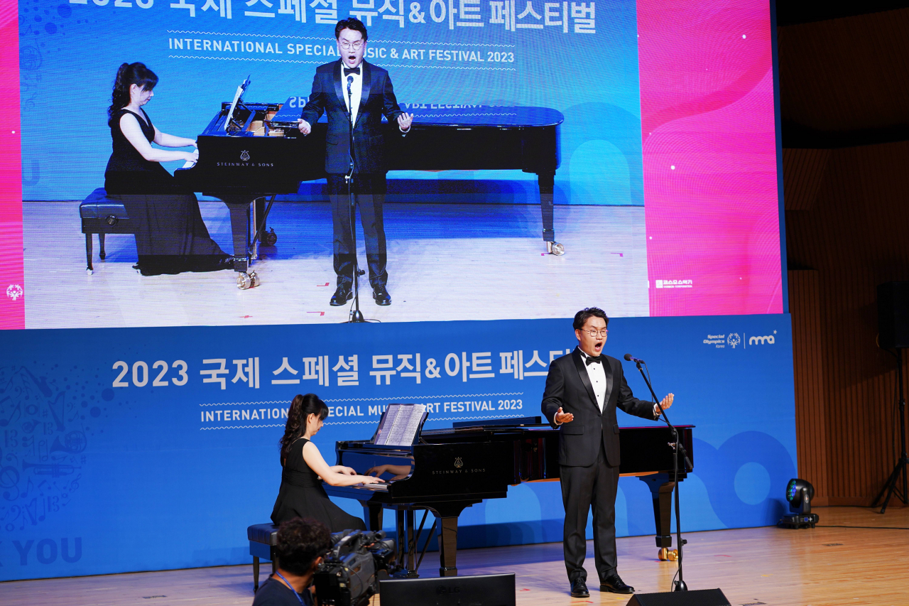 Tenor Yoon Young-jun, who has developmental disabilities, performs at the opening concert of the 2023 International Special Music & Art Festival on Aug. 1 at Seoul National University. (Special Olympics Korea)