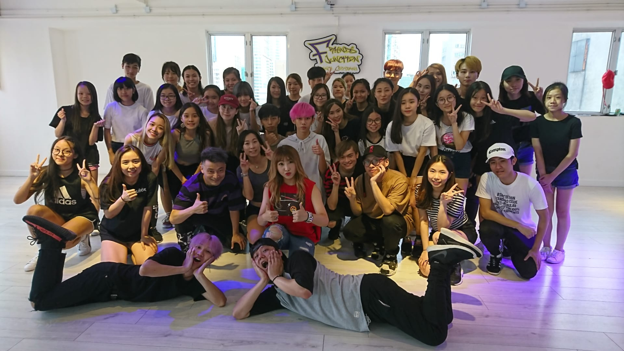 Minzy of 2NE1 (second row, center) and students of the Friends Junction Dance Company (Courtesy of FJDC)