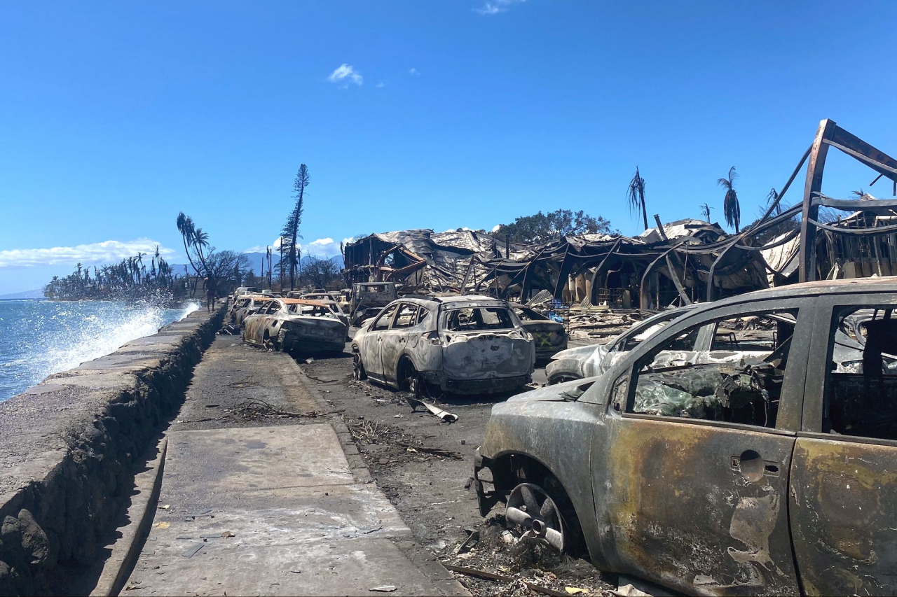 Burned cars and destroyed buildings are pictured in the aftermath of a wildfire in Lahaina, western Maui, Hawaii on Thursday. (AFP)